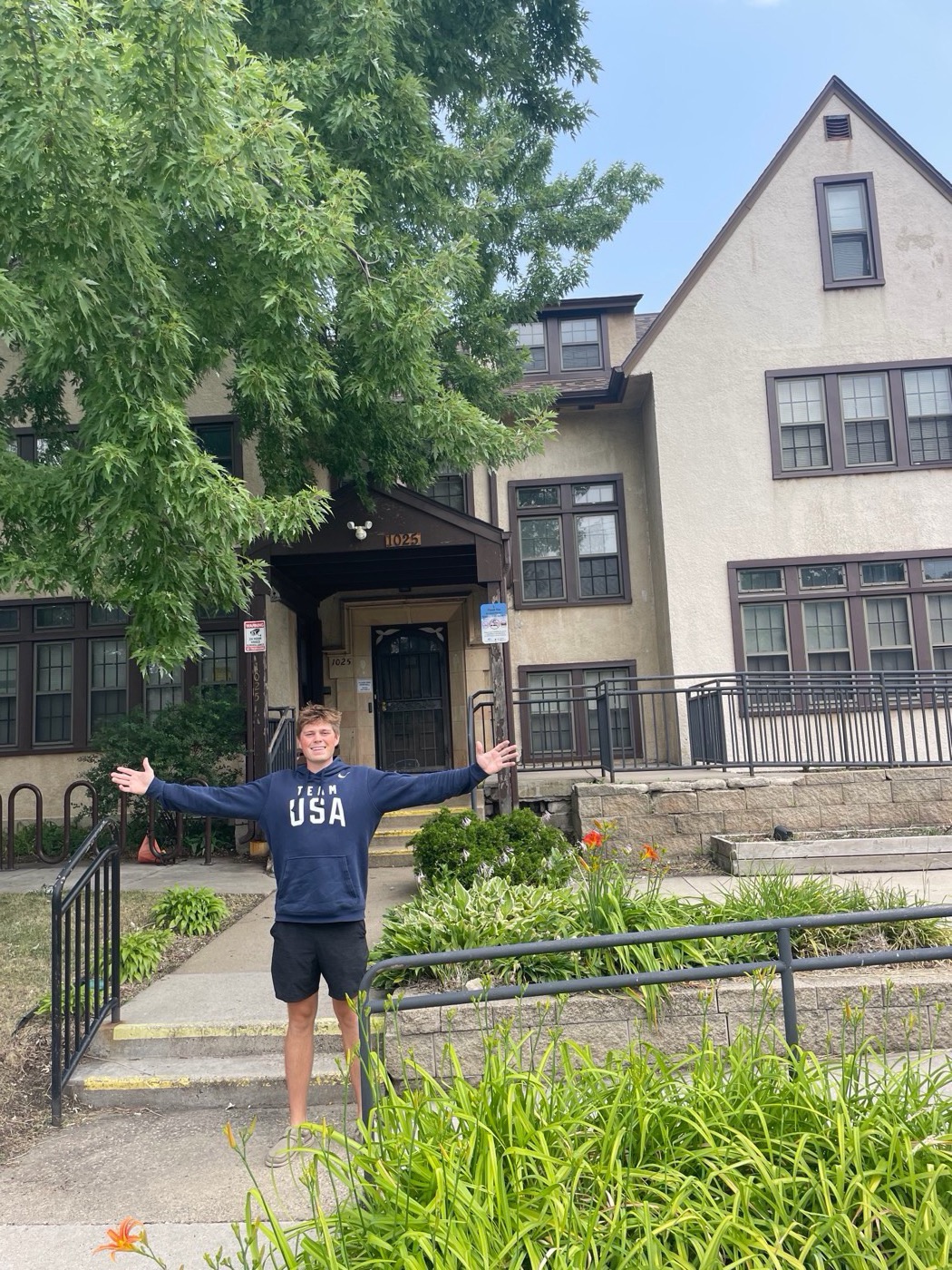 Luke in front of one of his properties